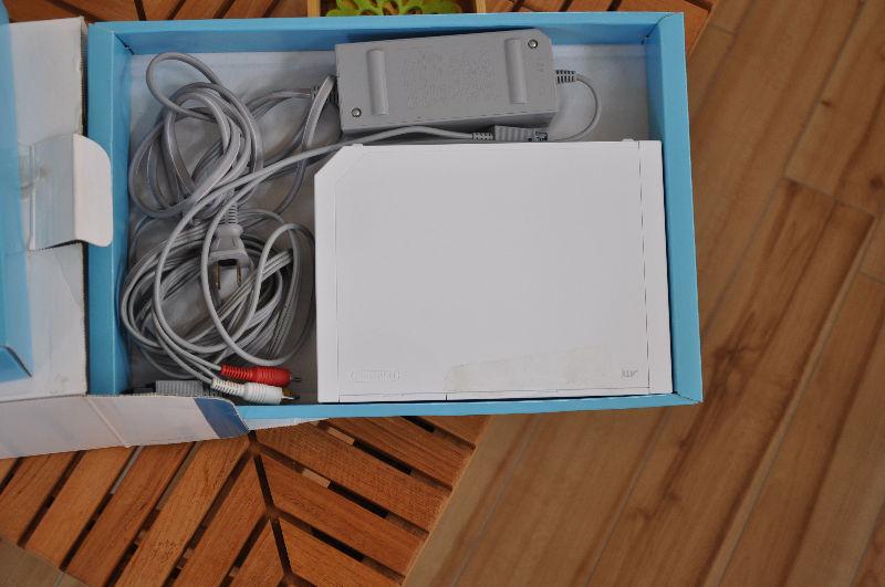 WII CONSOLE WITH, JOEY AND TWO HAND HELD STICKS