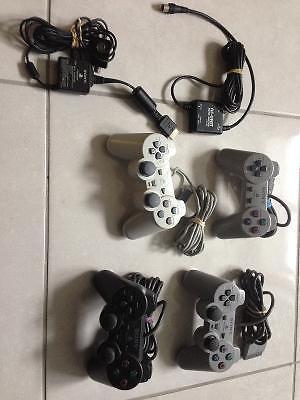 4 Playstation 1 Contollers & RF Unit
