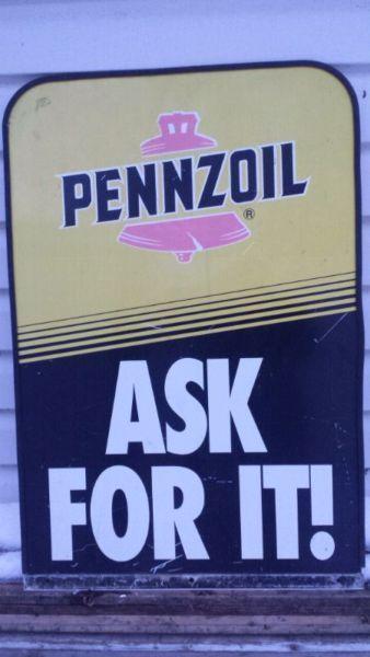 Double sided Pennzoil sign