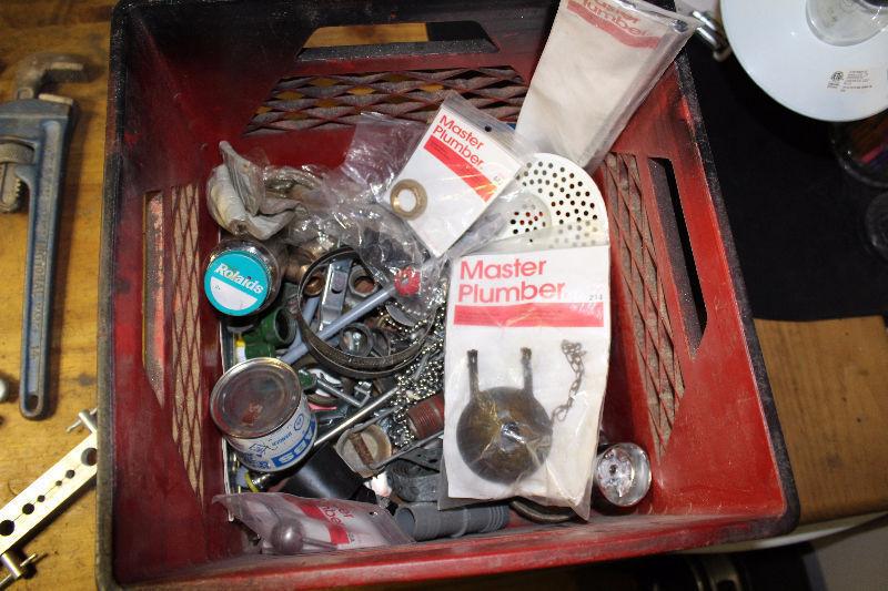 Plumbing tools hand and a huge lot of fixtures & tiny pieces