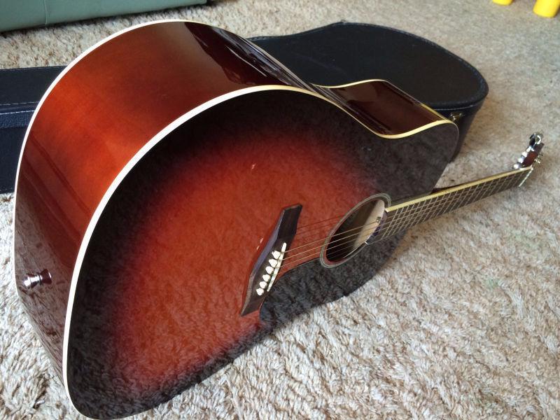 Traditional acoustic guitar with case
