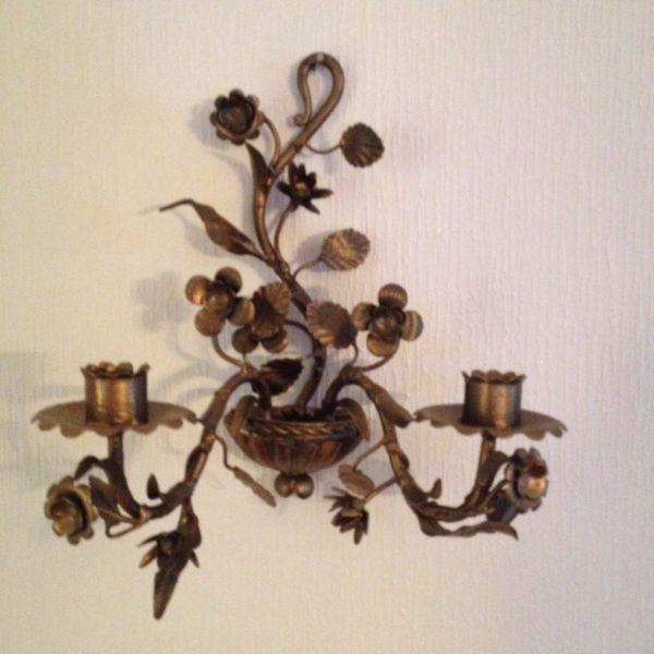 Two metal wall hanging candle holders