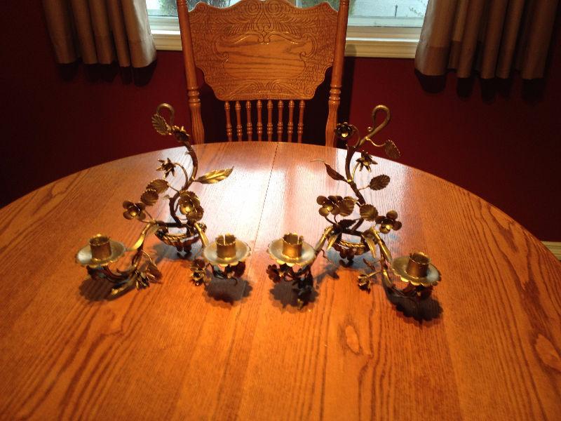 Two metal wall hanging candle holders