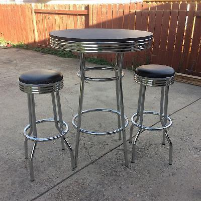 Tall table with 2 swivel stools