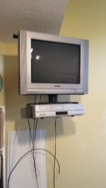 TV, wall mounted stand and VCR