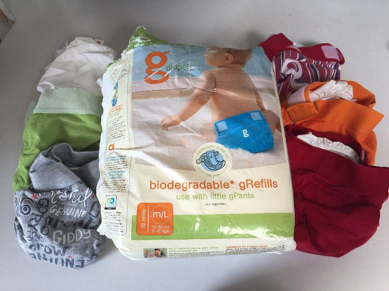 G diapers - 4 medium diapers, 1 large diaper, 30 cloth liners