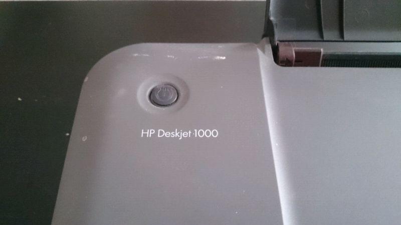 HP Deskjet-1000 printer with HP 61 black and colour cartridge