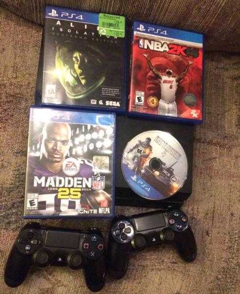 *Playstation 4 with 4 games and 2 controllers