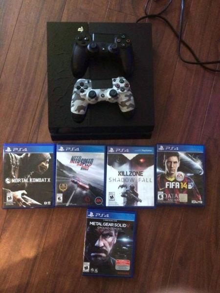 Selling PS4 with 5 games and 2 controllers