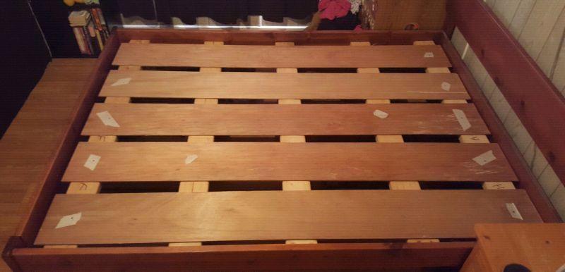 A VERY NICE SOLID QUEEN BED FRAME $150.00 ((OBO)) TAKES IT AWAY