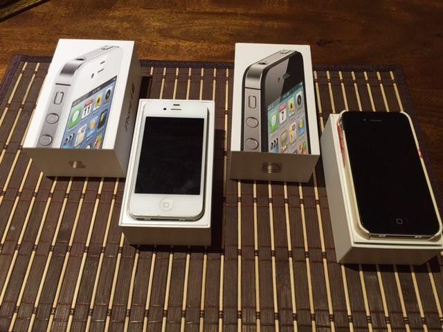 Two iPhone 4s phones and docking station