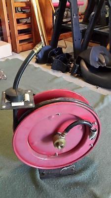 Air compressor hose reel with hose