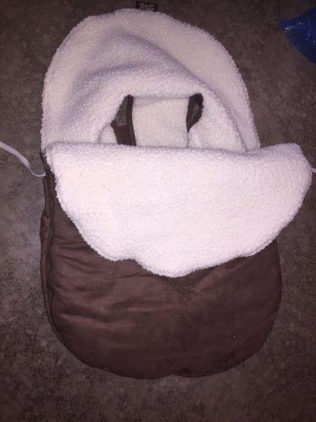 Car seat cover. Cozy cover for your baby in their car seat
