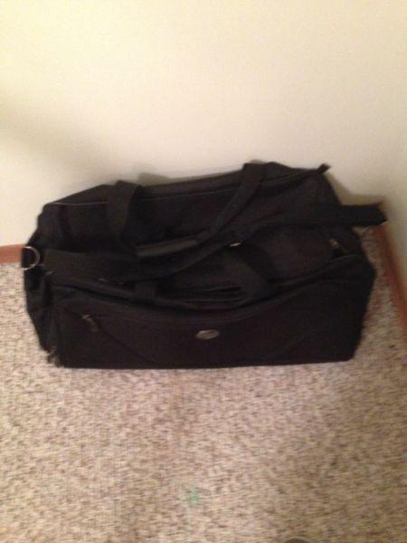 Rolling Duffel Bag - American Tourister - Brand New