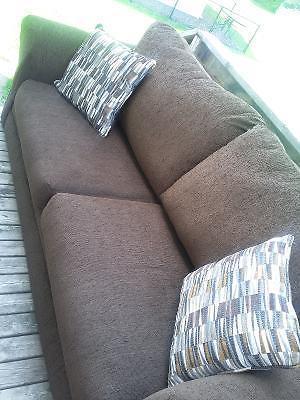 Brown sofa + 2 cushions ( Only 3 months old )