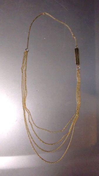 Long gold-colored necklace, fair trade