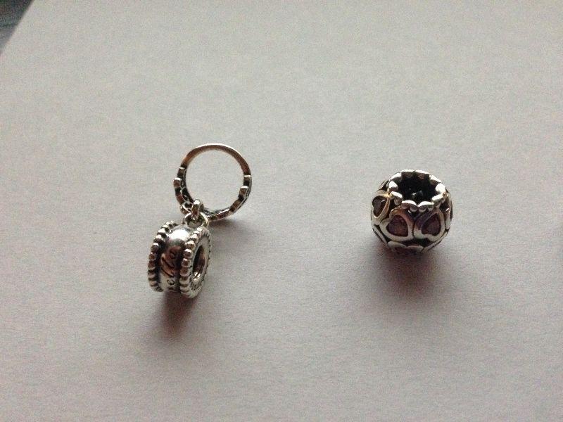 PANDORA 2 RINGS AND A CHARM LEFT