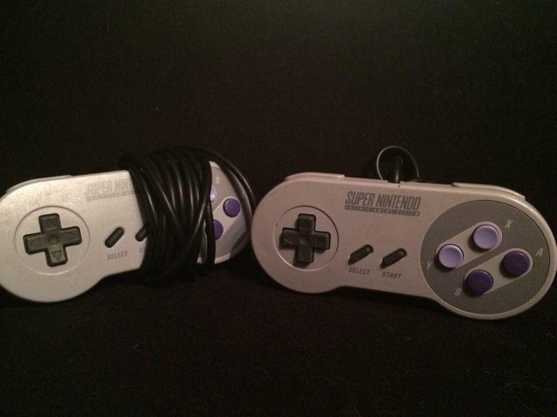 Two Super Nintendo controllers