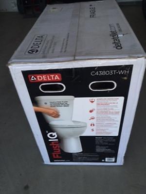 New in box Delta motion sensor low flush elongated toilet