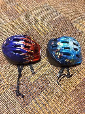Two children's helmets for sale
