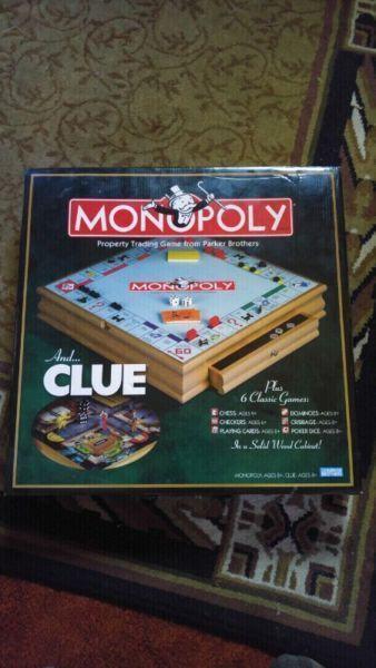 Wooden Monopoly and Clue plus 6 other games. Brand new