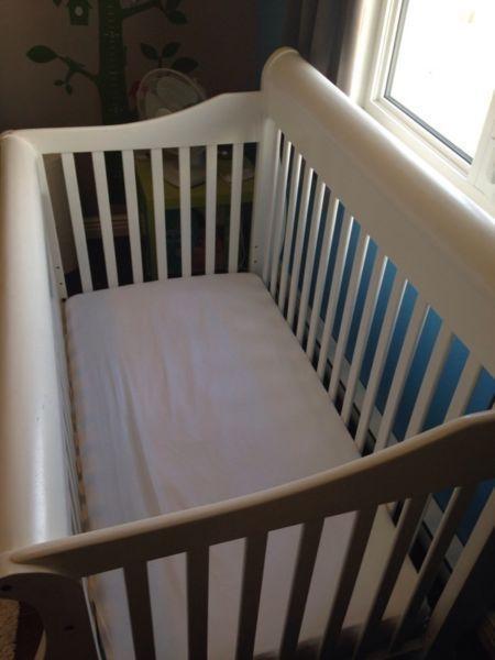 White convertible crib and change table