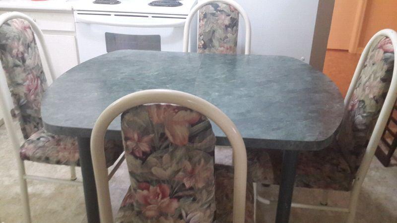 Table and four chairs..can deliver
