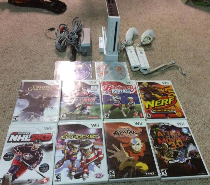 Nintendo Wii With 2 Controllers/Nunchucks and 10 Games!!