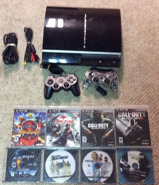 160GB Playstation 3 with 2 Controllers and 8 Games!