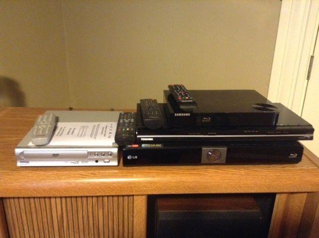 Four assorted DVD players