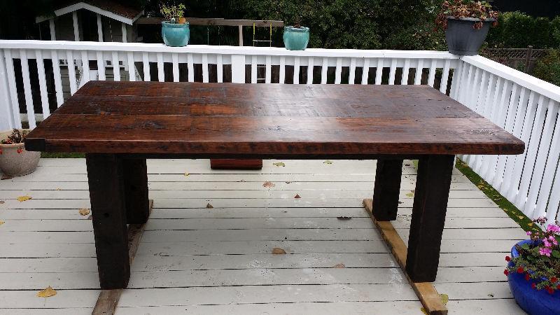 Custom built harvest table using reclaimed Vancouver, BC wood