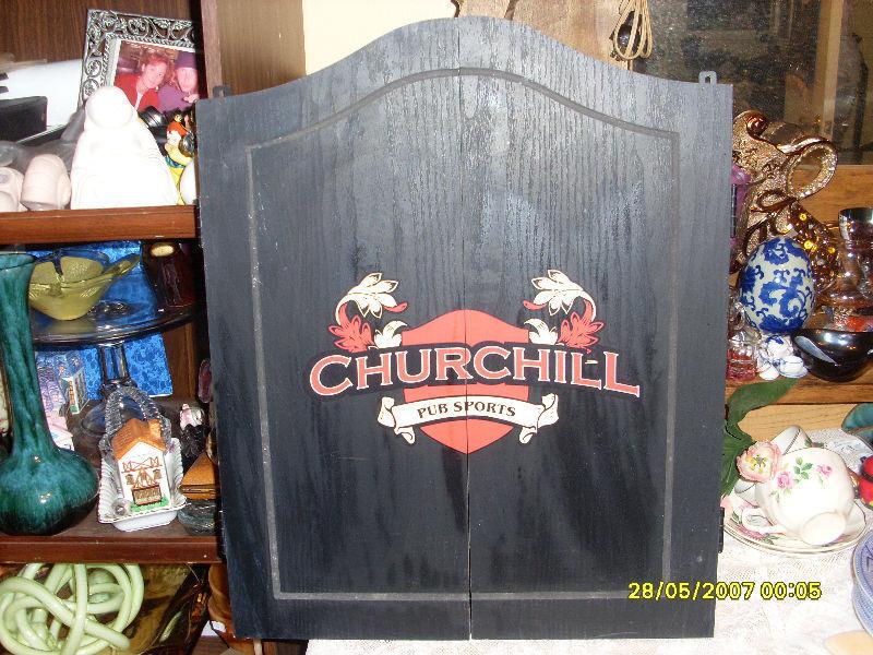 Churchill dart board cabinet with 6 darts