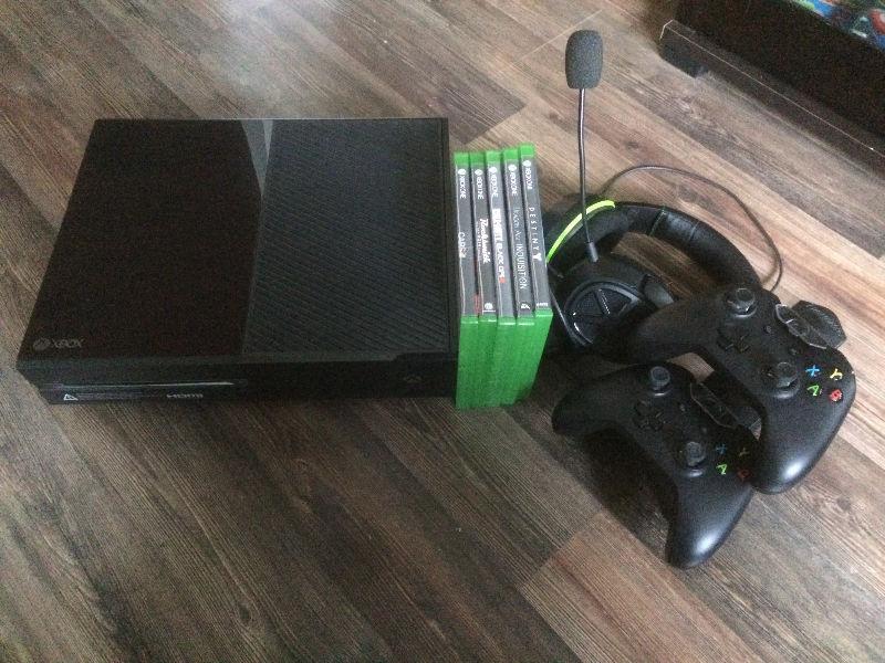 XBONE. Two controllers and games shown