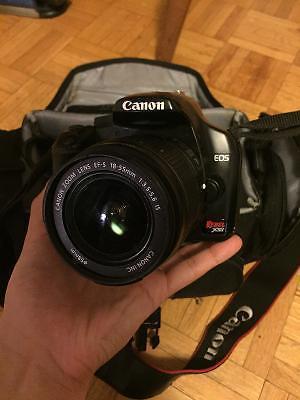 Canon Rebel XSi DSLR Camera with EF-S 18-55mm f/3.5-5.6 IS Lens