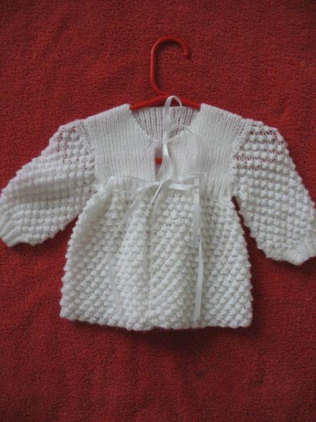 White sweater for baby