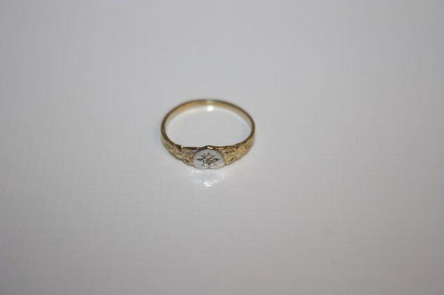 10k gold with small diamond, childs ring, size 1
