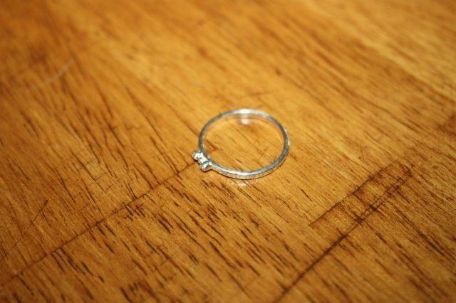Sterling silver diamond ring, two small diamonds. Size 7