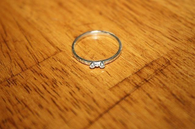 Sterling silver diamond ring, two small diamonds. Size 7