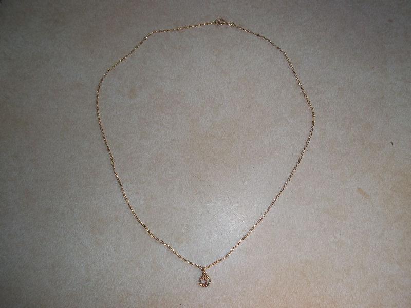 10k Gold chain and 10 Kt pendant excellent condition