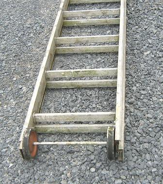 ALUMINUM LADDER 32FT LONG ,17 INCHES WIDEST SECTION