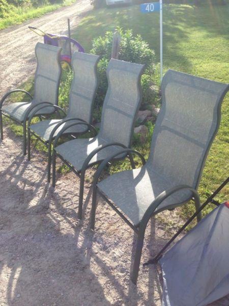 Four patio chairs