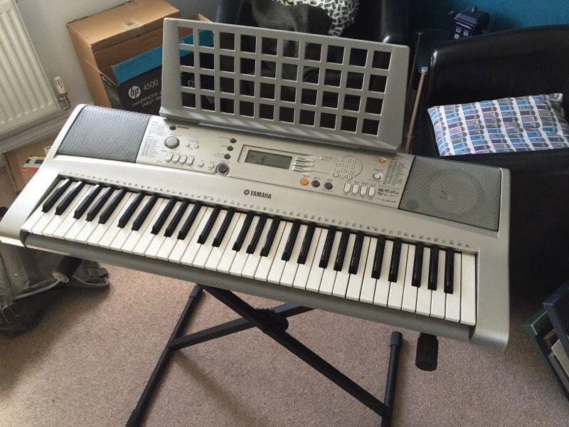 Yamaha keyboard PSR E303 with Adapter and Stand
