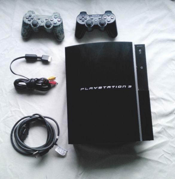 PS3 System, 2 Controllers, RCA cable, Power cord, Plus 22 games