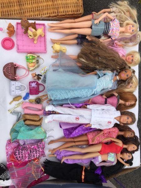 Assorted barbies, accessories