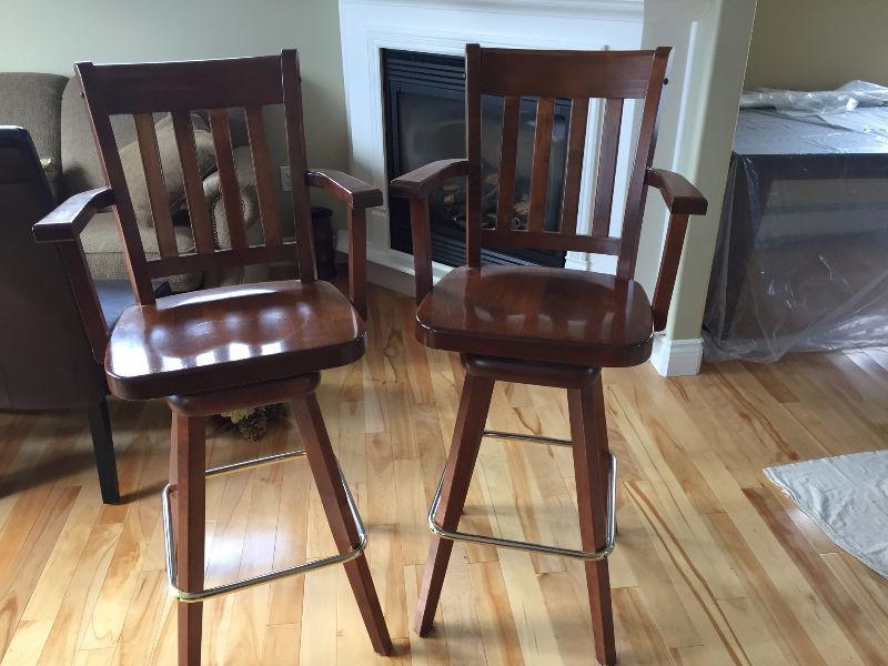 Two solid wood bar stools