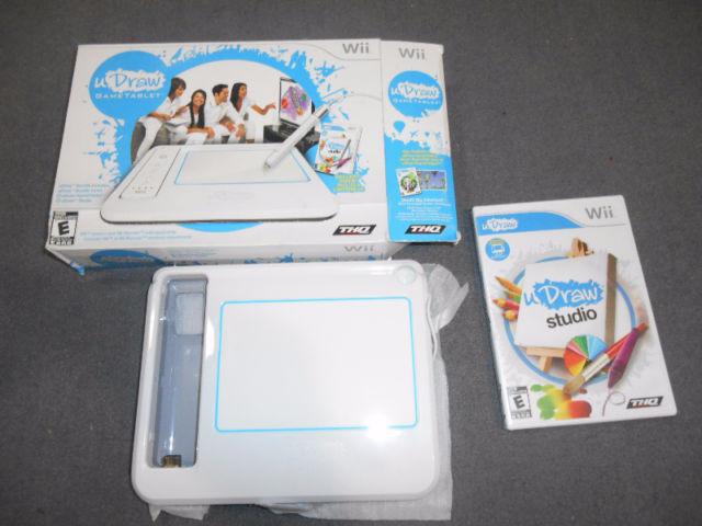 WII CONSOLE WITH 2 REMOTE SETS AND GAMES