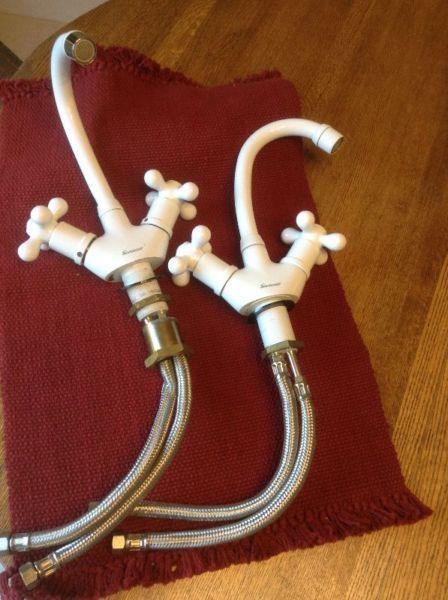 2 used Supergrif faucets