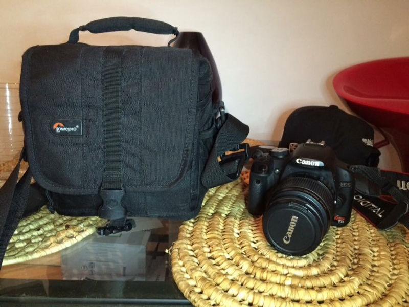 canon rebel t1i + 18-55mm lens + accessories slightly use and in