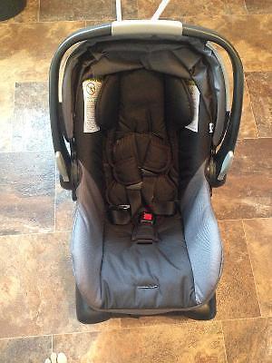 Britax car seat with base, bjorn carrier and car seat cover