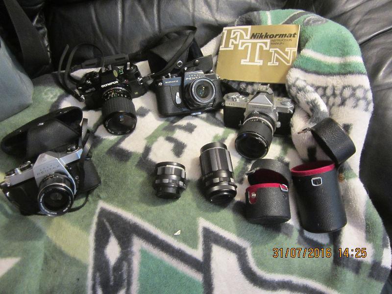 LOT OF 4 35MM CAMERAS AND NOS EXPIRED FILM